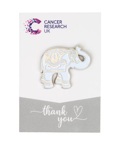 Silver elephant pin badge on white and grey backing card